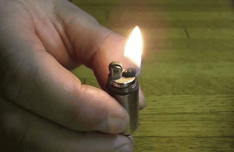 Holding Survival Lighter